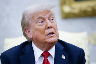 Donald Trump answers journalists' questions, as they meet NATO Secretary General Mark Rutte in an oval office in the White House